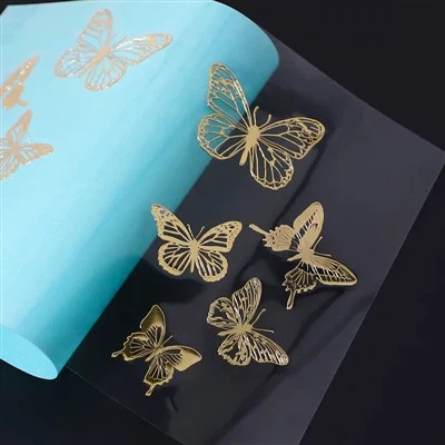 Metalliset nikkelimerkit -logo